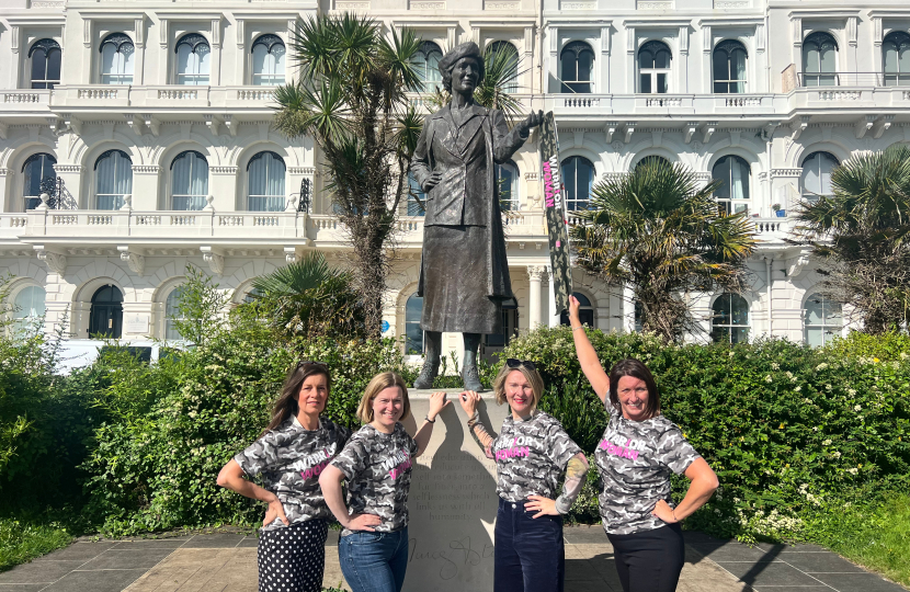 Rebecca poses with campaigners in front of Lady Aster statue